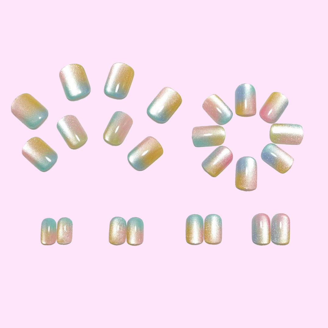 Artificial nails in delicate ombre design with glitter effects Bowlift