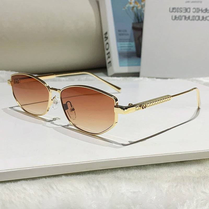 Women's elegant sunglasses with sparkling metal frame Bowlift