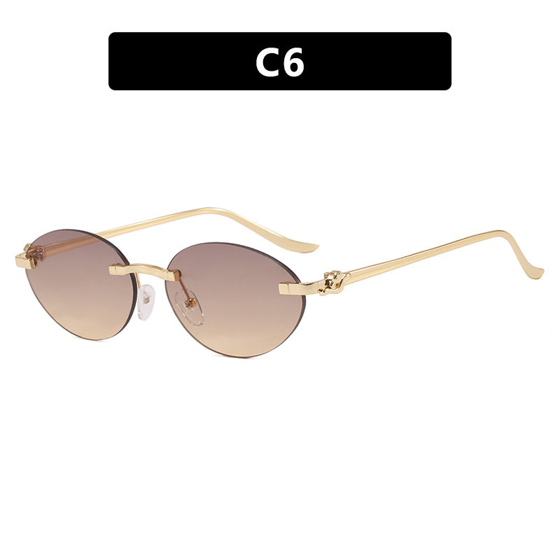Women's elegant oval sunglasses with golden accents Bowlift