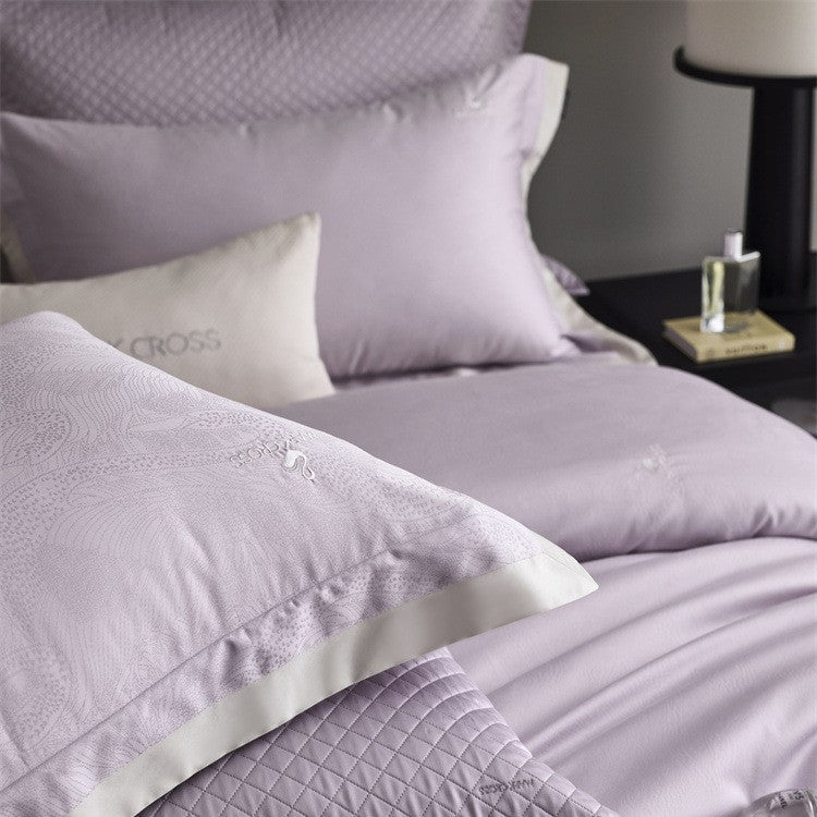 Premium duvet cover set with subtle jacquard structure and decorative ribbon Bowlift