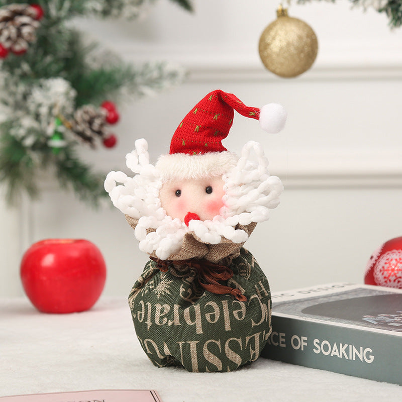 Cute Christmas gnome with gift sack Bowlift