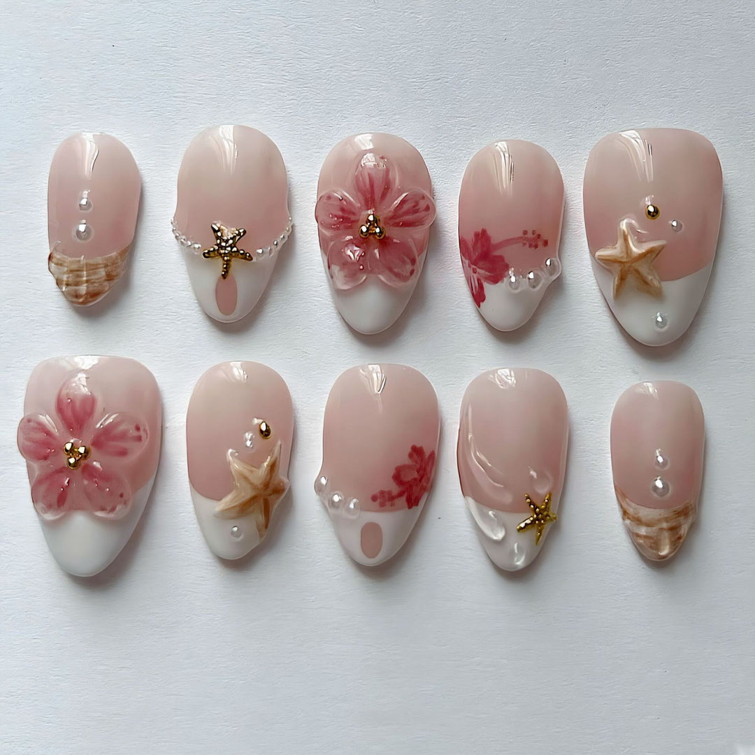 Artificial nail set with floral and maritime designs Bowlift