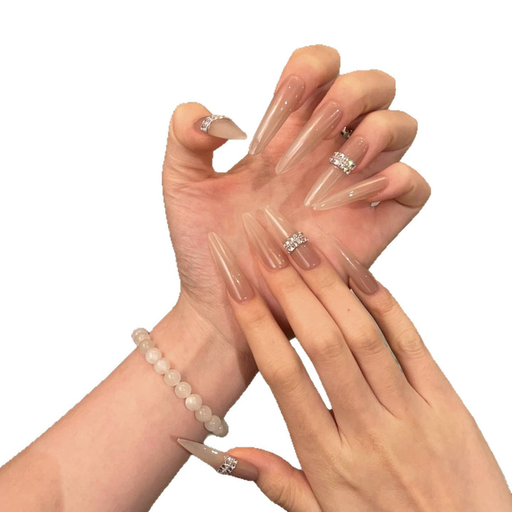 Stiletto Nail Art Tips with Rhinestone Accents Bowlift