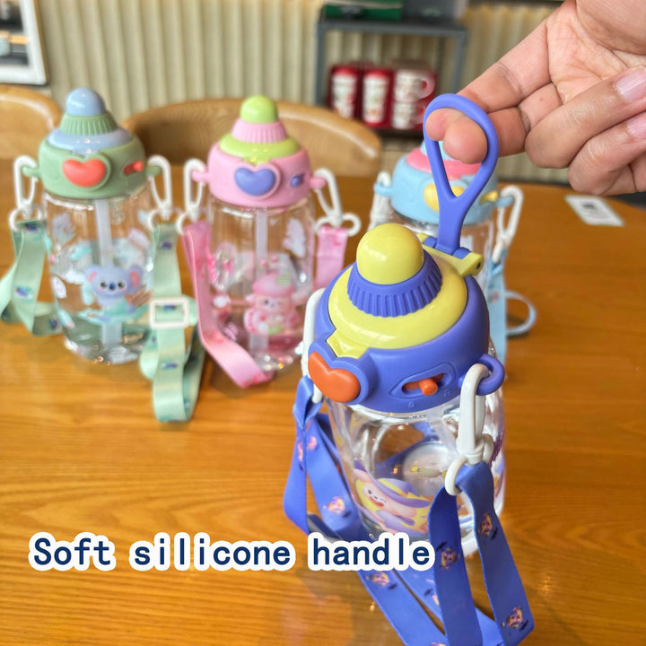 Women's transparent drinking bottle with ergonomic carrying handle and integrated straw Bowlift