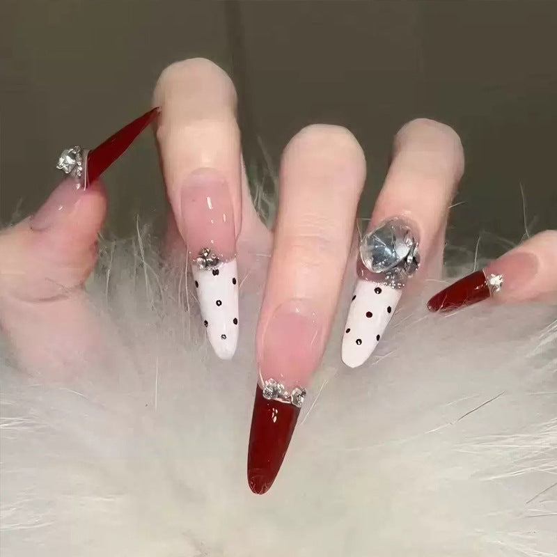Artificial nail set with festive gift design and elegant glitter accents Bowlift