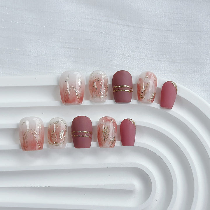 Artistic Press-On Nail Art Set with Heart and Celestial Designs