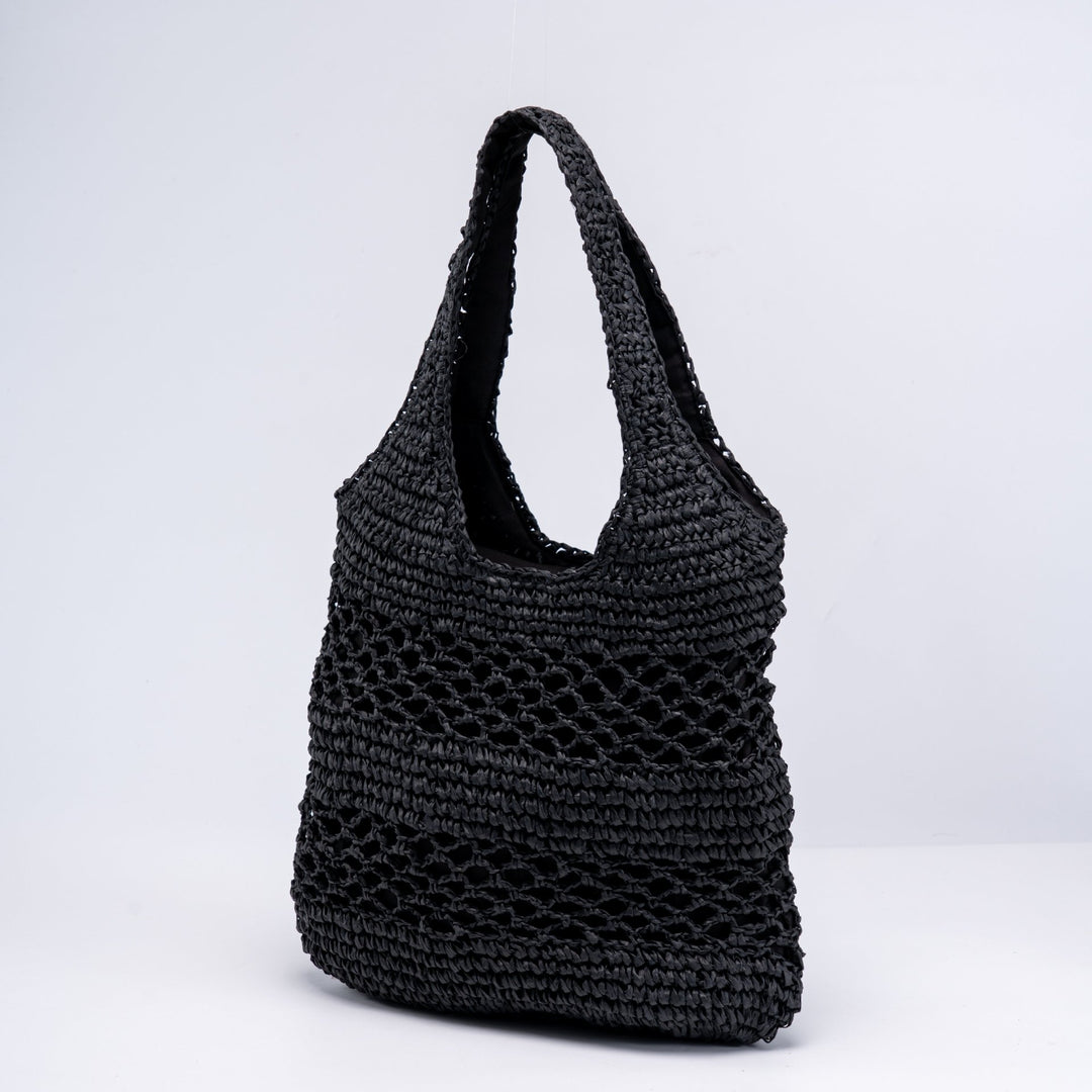 Handwoven beach bag with open mesh structure Bowlift