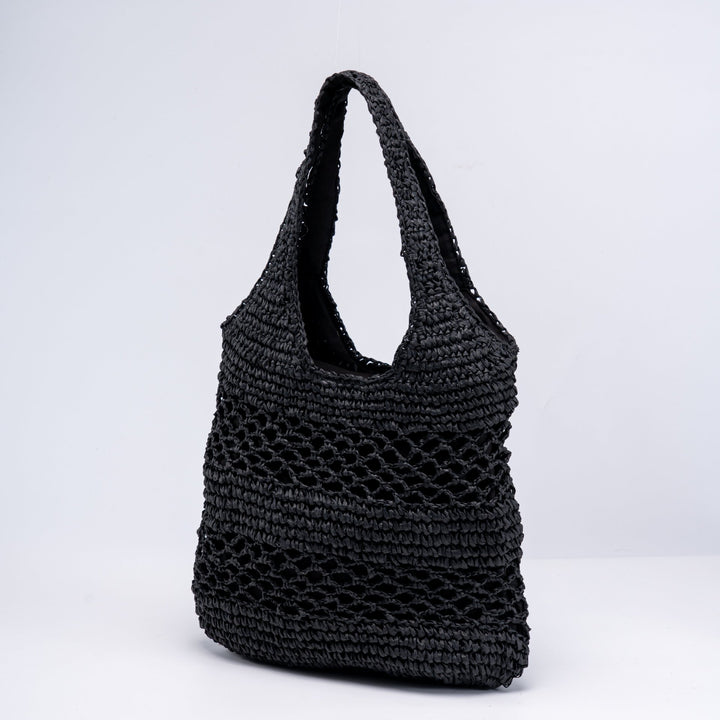 Handwoven beach bag with open mesh structure Bowlift