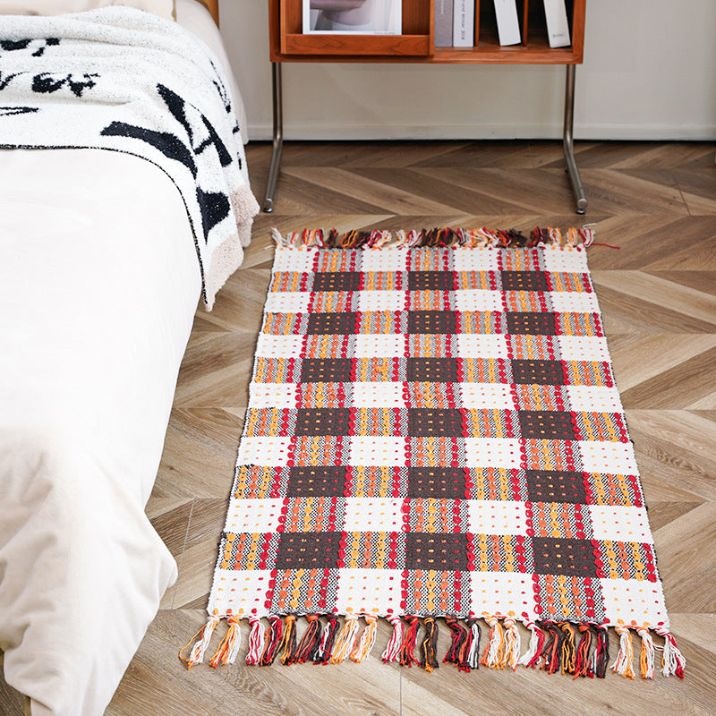 woven living room runner with fringes and geometric weave pattern