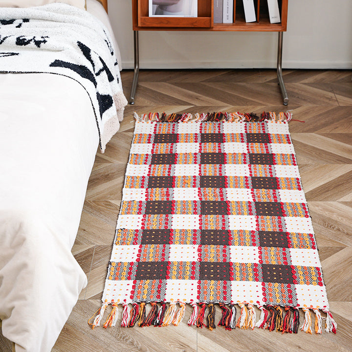 woven living room runner with fringes and geometric weave pattern