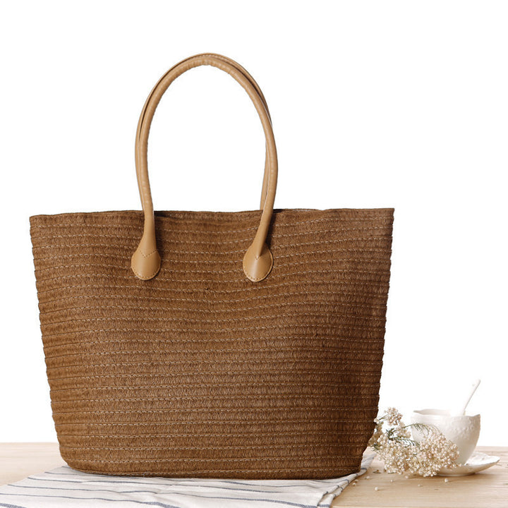 Spacious straw shopper with leather carrying handles Bowlift