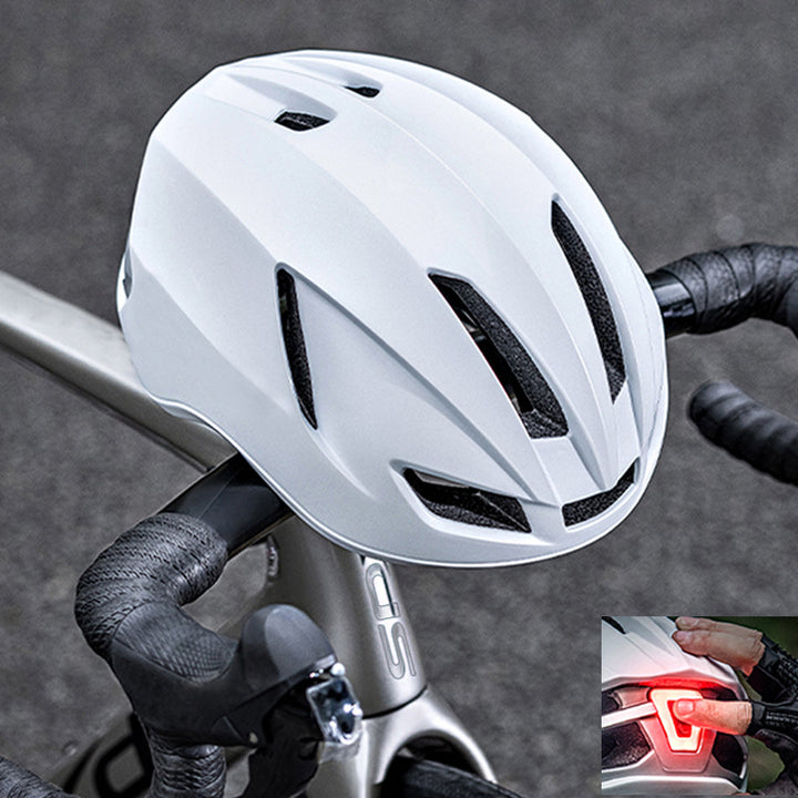 Road bike helmet with integrated safety light Bowlift