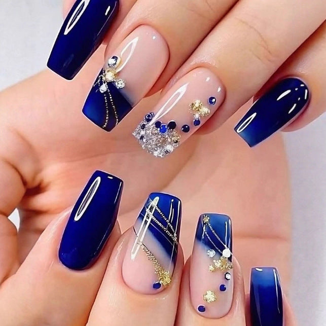 Artificial nails in a playful flower design with glittering accents Bowlift