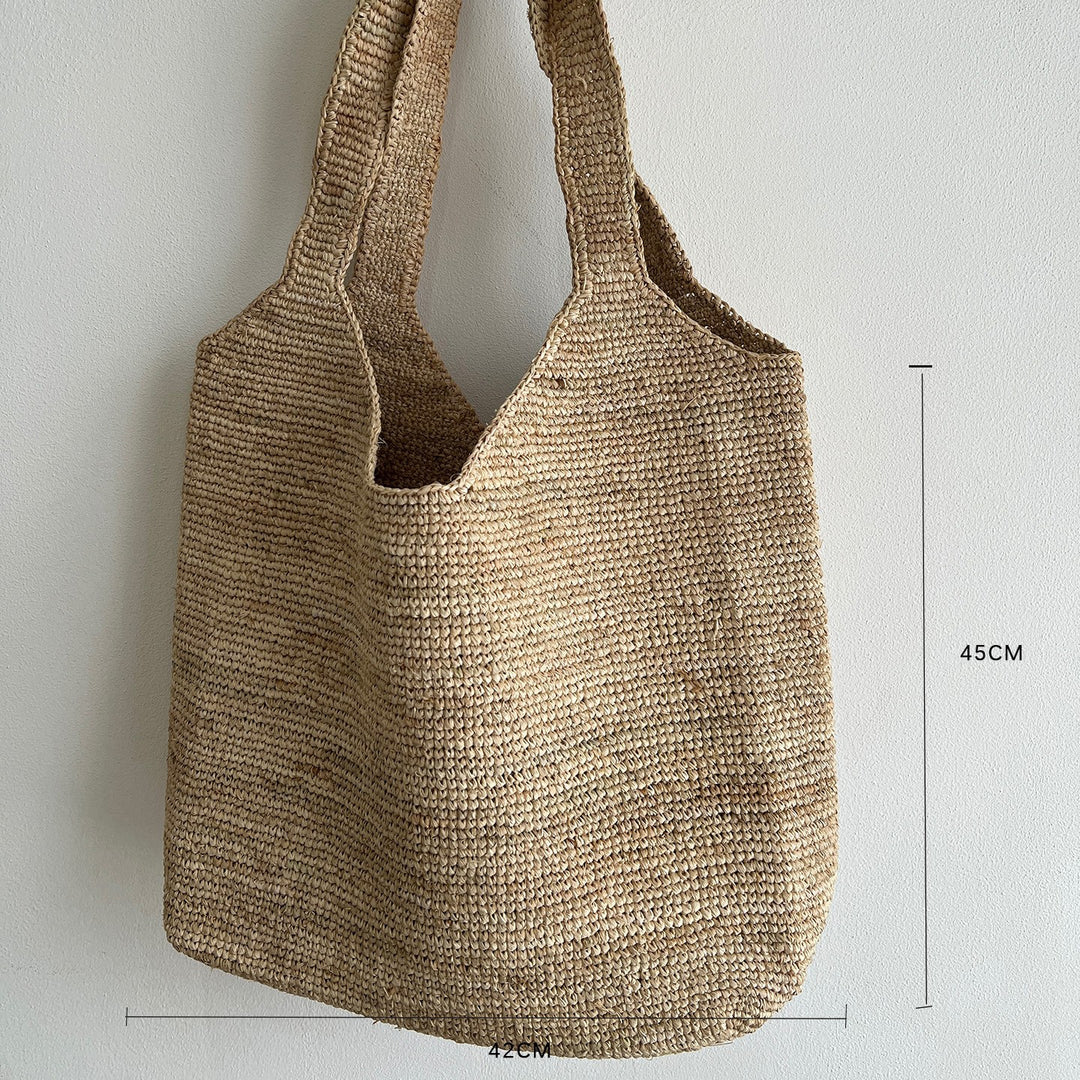 Handcrafted knitted bag with floral design Bowlift