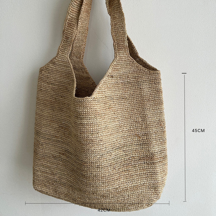 Handcrafted knitted bag with floral design Bowlift
