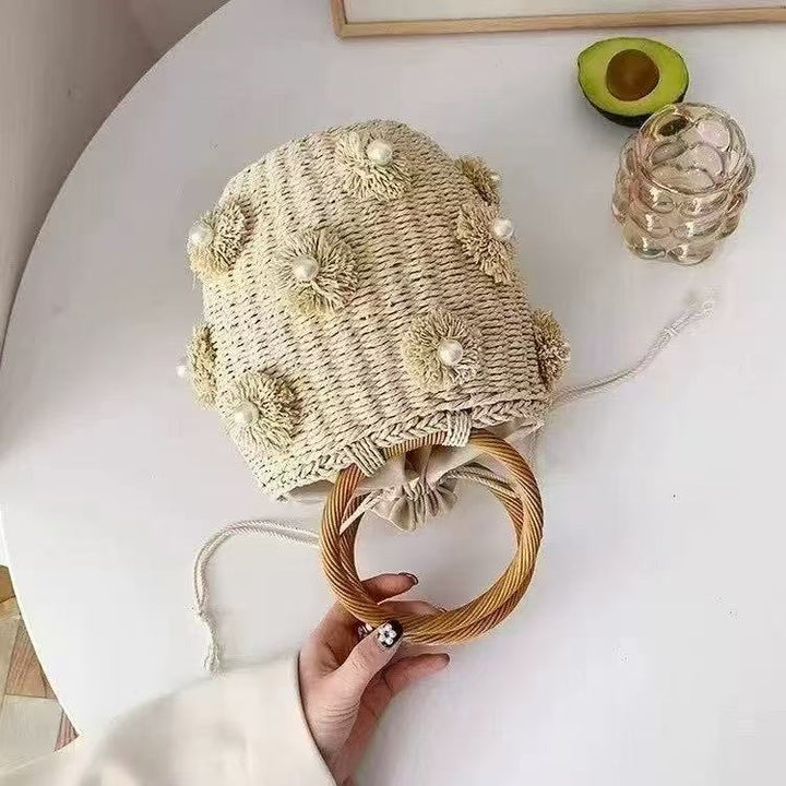 Refined handbag with pearl applications Bowlift