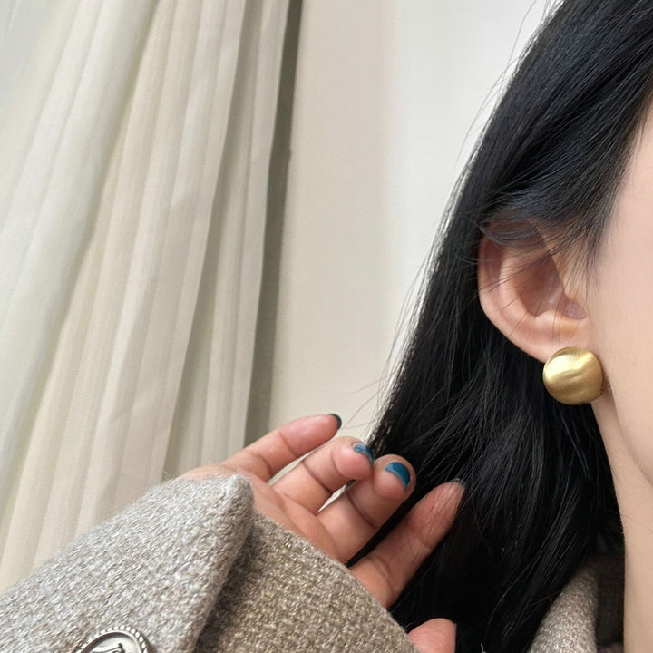 Elegant earrings made of high-gloss metal Bowlift