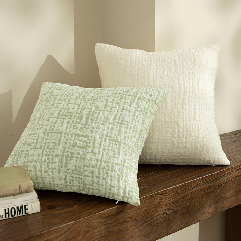 Square, quilted decorative pillow with woven texture Bowlift