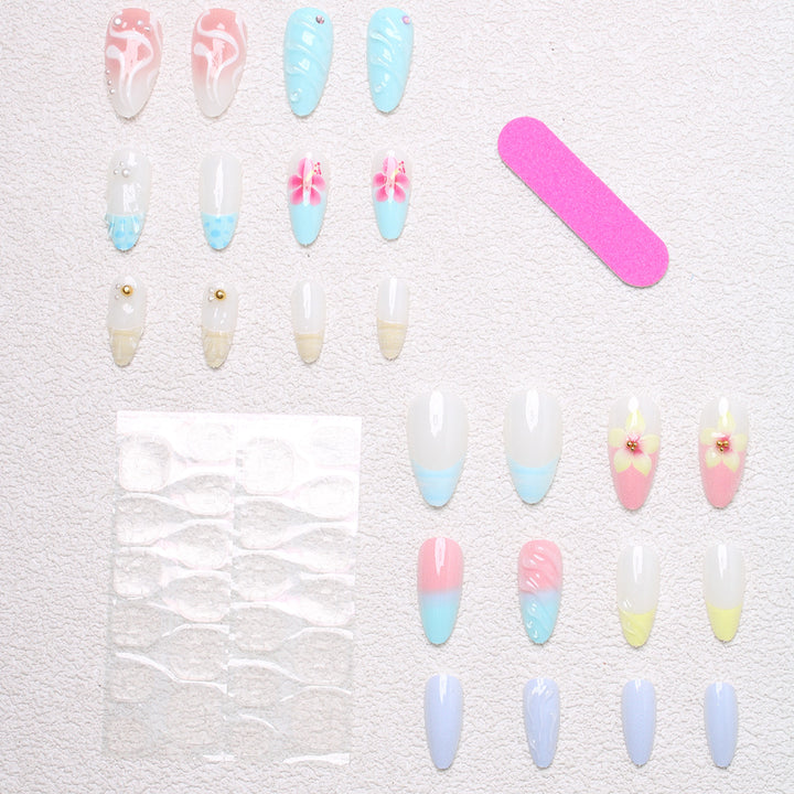 Artificial nail set with floral and shell-shaped designs Bowlift