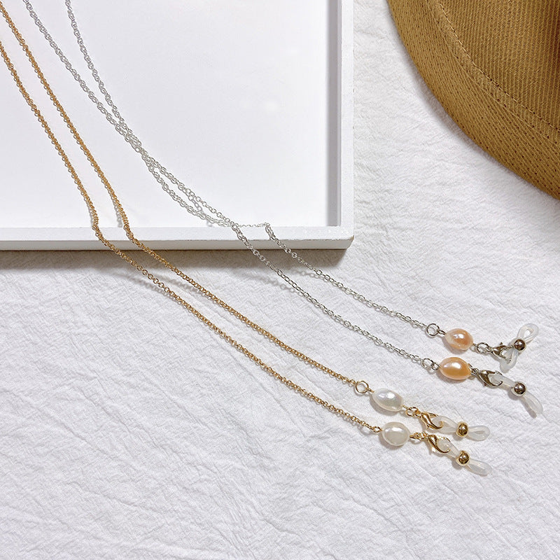 Elegant jewelry holder chain with pearl and gold accents Bowlift