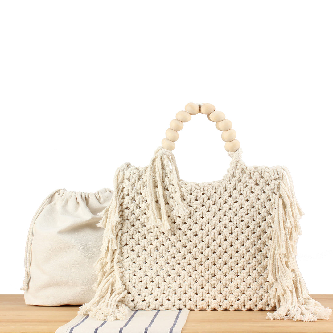 Creative crochet handbag with decorative fringes Bowlift