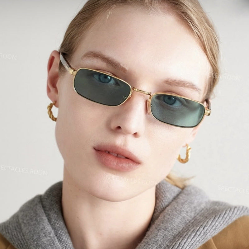 Ladies fashionable sunglasses with stylish metal frame and orange lenses Bowlift