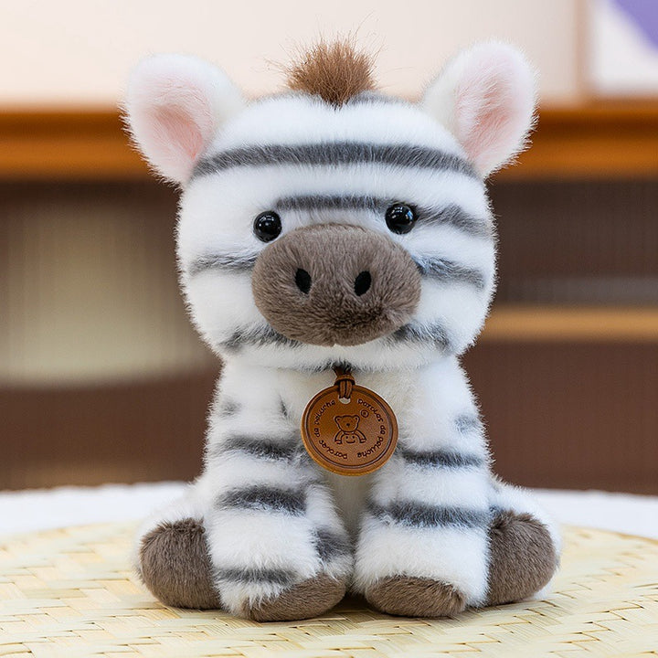 Plush Sitting Lion Cub Collectible with Embroidered Face and Hanging Medallion Bowlift