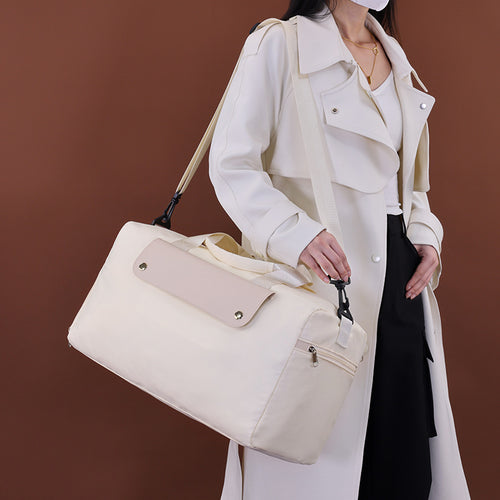 Versatile Travel Bag With Practical Carrying Handles And Removable Shoulder Strap Bowlift