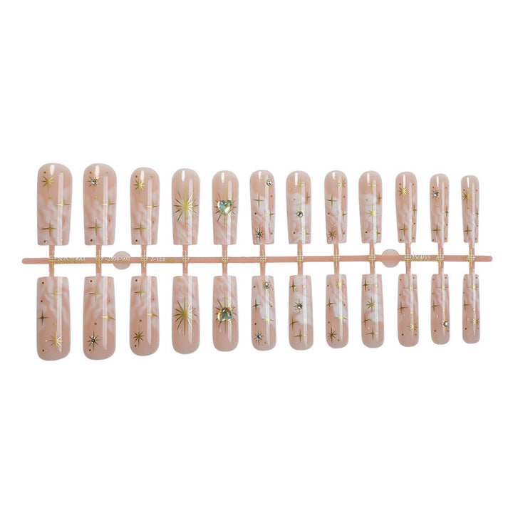 Nail set with glamorous gold decorations Bowlift