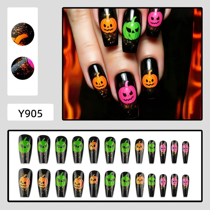 Halloween-style artificial nails with graphic pumpkin designs Bowlift