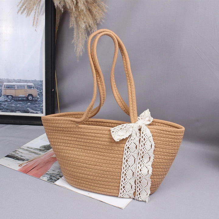 Basket bag with playful lace accent Bowlift