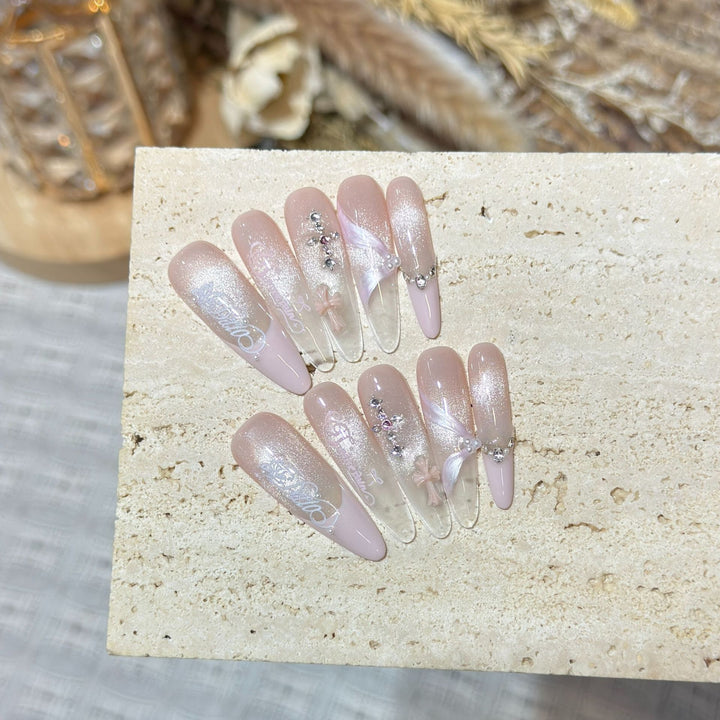 Elegant Stiletto Press-On Nail Set with Intricate Designs Bowlift