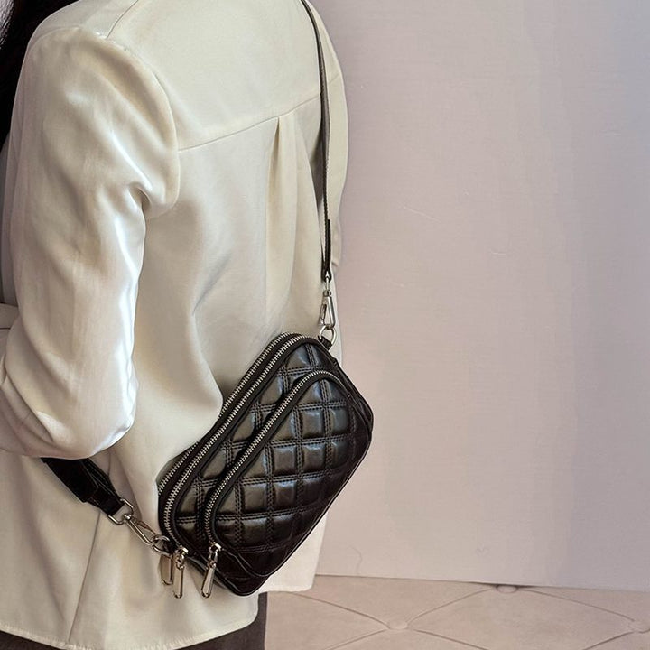 Shoulder bag with stylish quilted pattern Bowlift