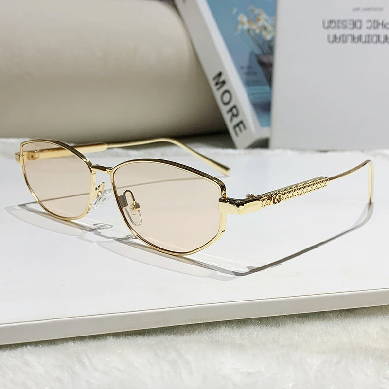 Women's elegant sunglasses with sparkling metal frame Bowlift