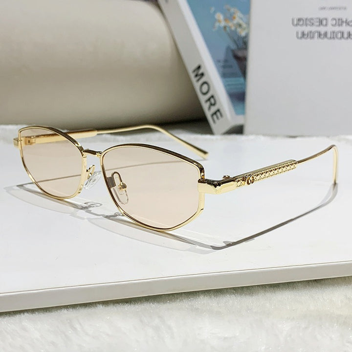 Women's elegant sunglasses with sparkling metal frame Bowlift