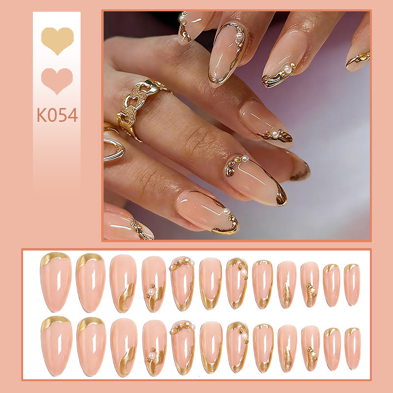 Elegant artificial nails with golden accents Bowlift