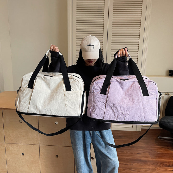 Sporty travel bag with practical outer pockets Bowlift