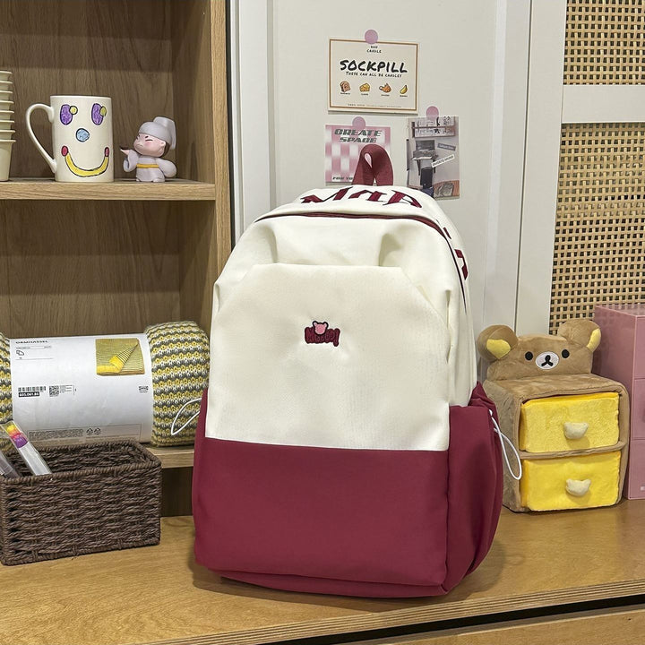 Playful backpack with embroidered Bowlift motif