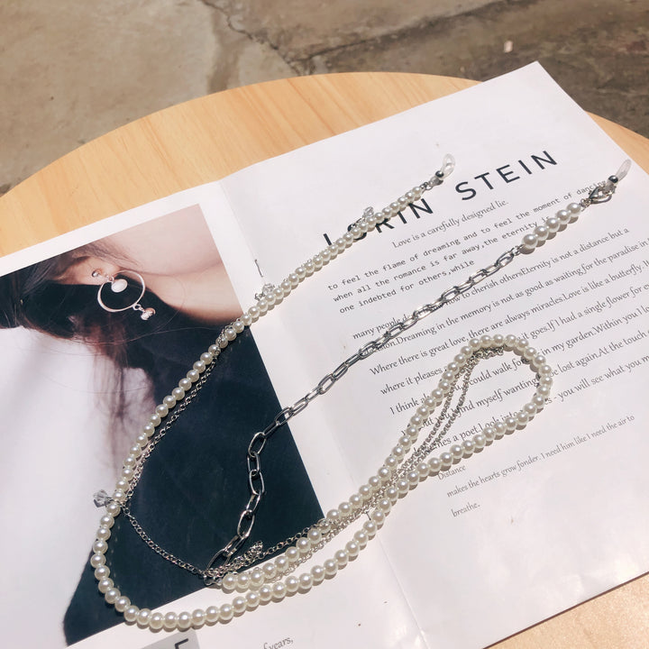 Elegant Pearl Accented Eyewear Chain Bowlift