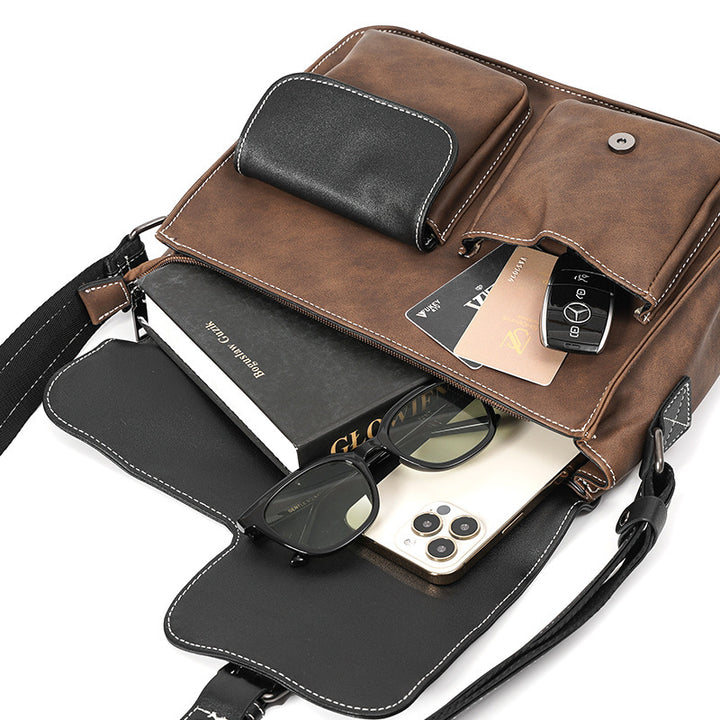 Robust shoulder bag with multiple external pockets Bowlift