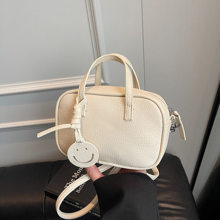 Compact Textured Mini Handbag Bowlift