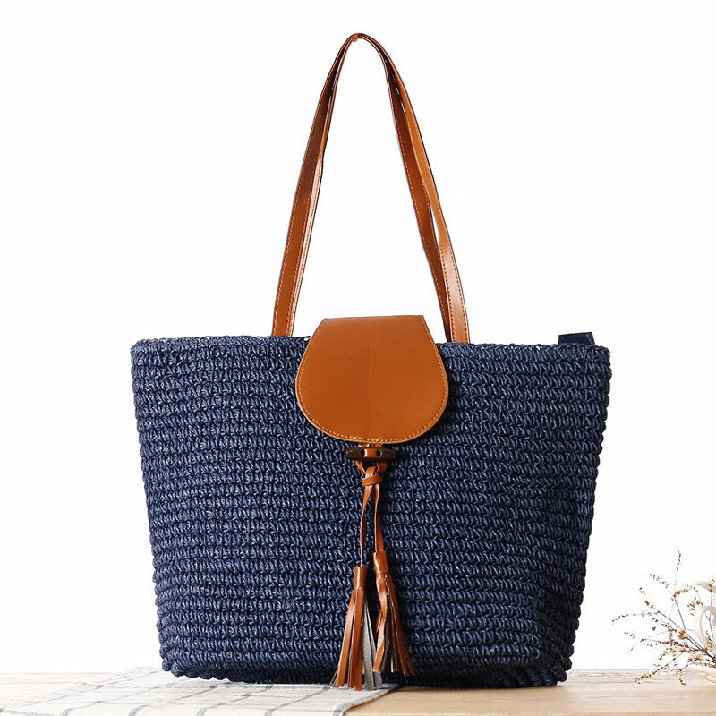 Elegant basket bag with leather accents Bowlift