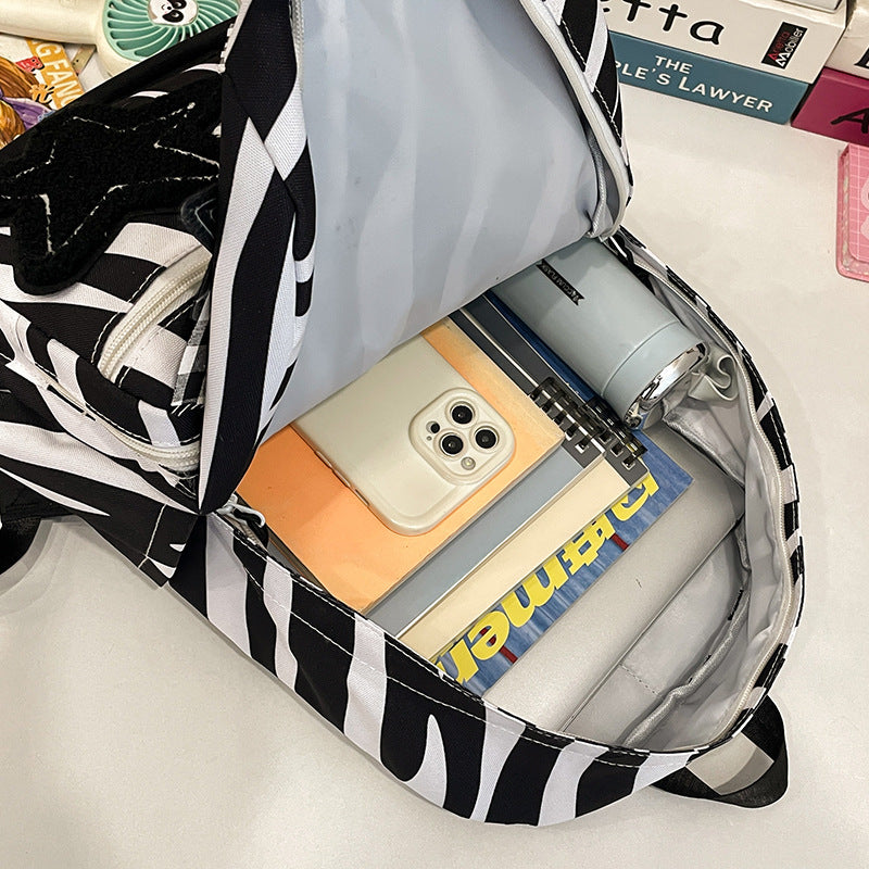 Backpack with Creative Applications and Practical Compartments Bowlift