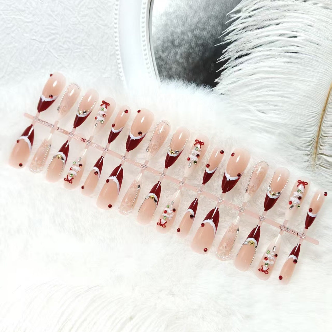 Artificial nails with festive designs and glitter accents Bowlift