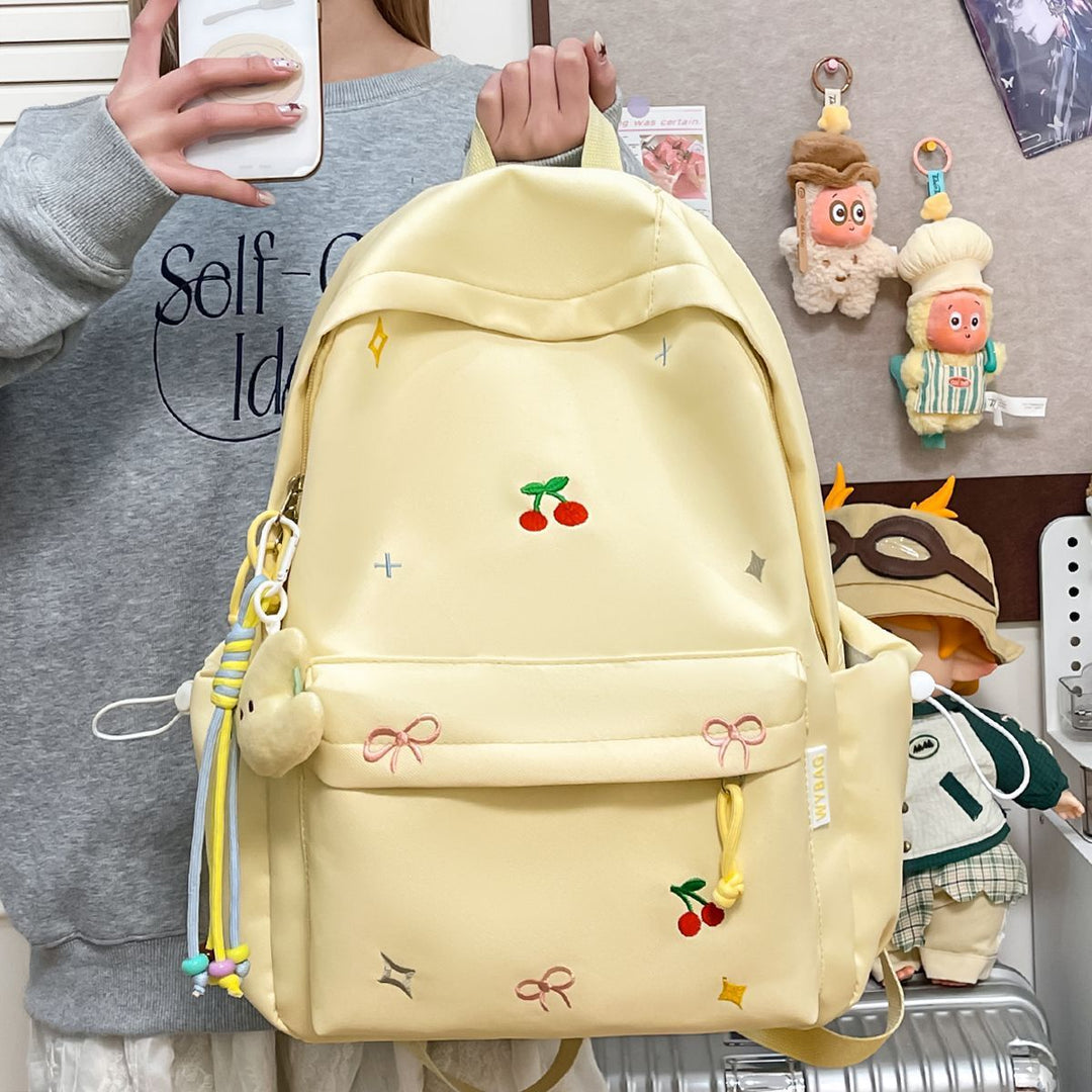 Playful backpack with embroidery Bowlift