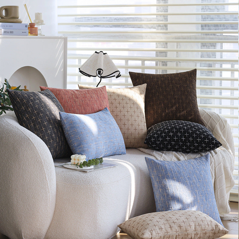 Square cushion cover in Scandinavian minimal style with woven cross pattern and natural linen look Bowlift