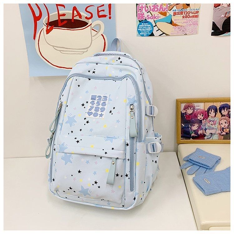 Playful backpack with star motifs and practical functions Bowlift