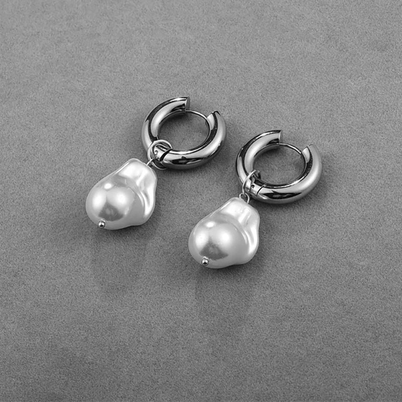 Fashionable earrings with double pearls Bowlift