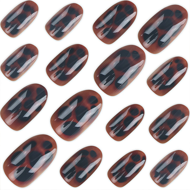 Glossy Stiletto Nail Tips with Leopard Print Design Bowlift