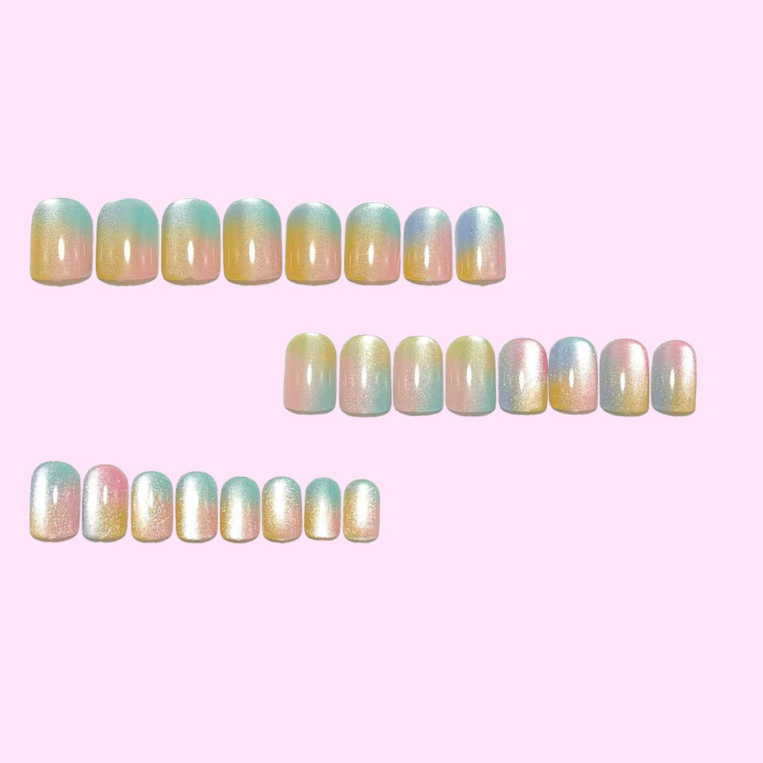 Artificial nails in delicate ombre design with glitter effects Bowlift
